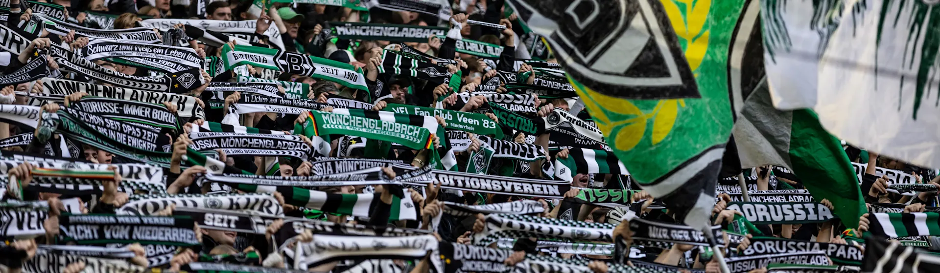 Nordkurve von Borussia Mönchengladbach Fans der Nordkurve von Borussia Mönchengladbach feiern einen Heimsieg. Energie kommt von der NEW Energie.
