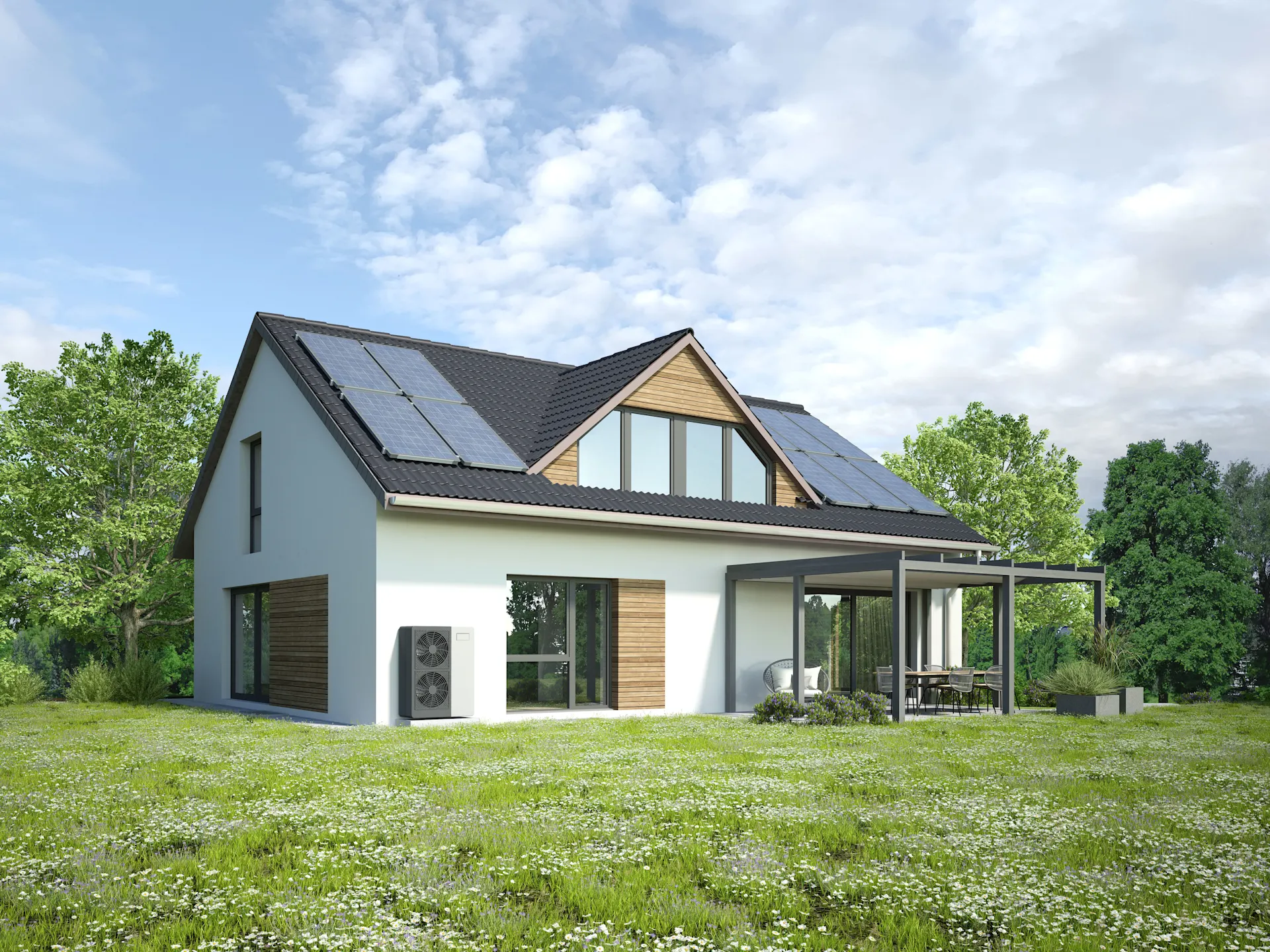 Ein modernes Einfamilienhaus mit PV-Anlage und Wärmepumpe. 